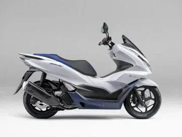 El Honda PCX 125 híbrido destaca por su diseño elegante y eficiente. El Honda PCX 125 híbrido destaca por su diseño elegante y eficiente.