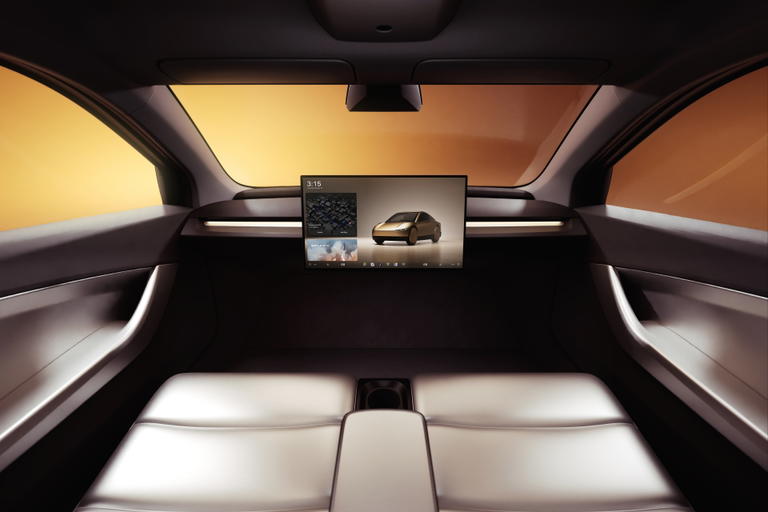 Interior sofisticado y minimalista del futuro Robotaxi de Tesla.