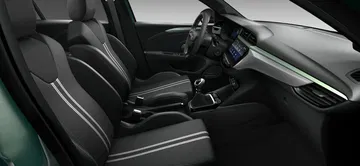 Vista del habitáculo del Opel Corsa YES, destacando sus cómodos asientos y diseño moderno. Vista del habitáculo del Opel Corsa YES, destacando sus cómodos asientos y diseño moderno.