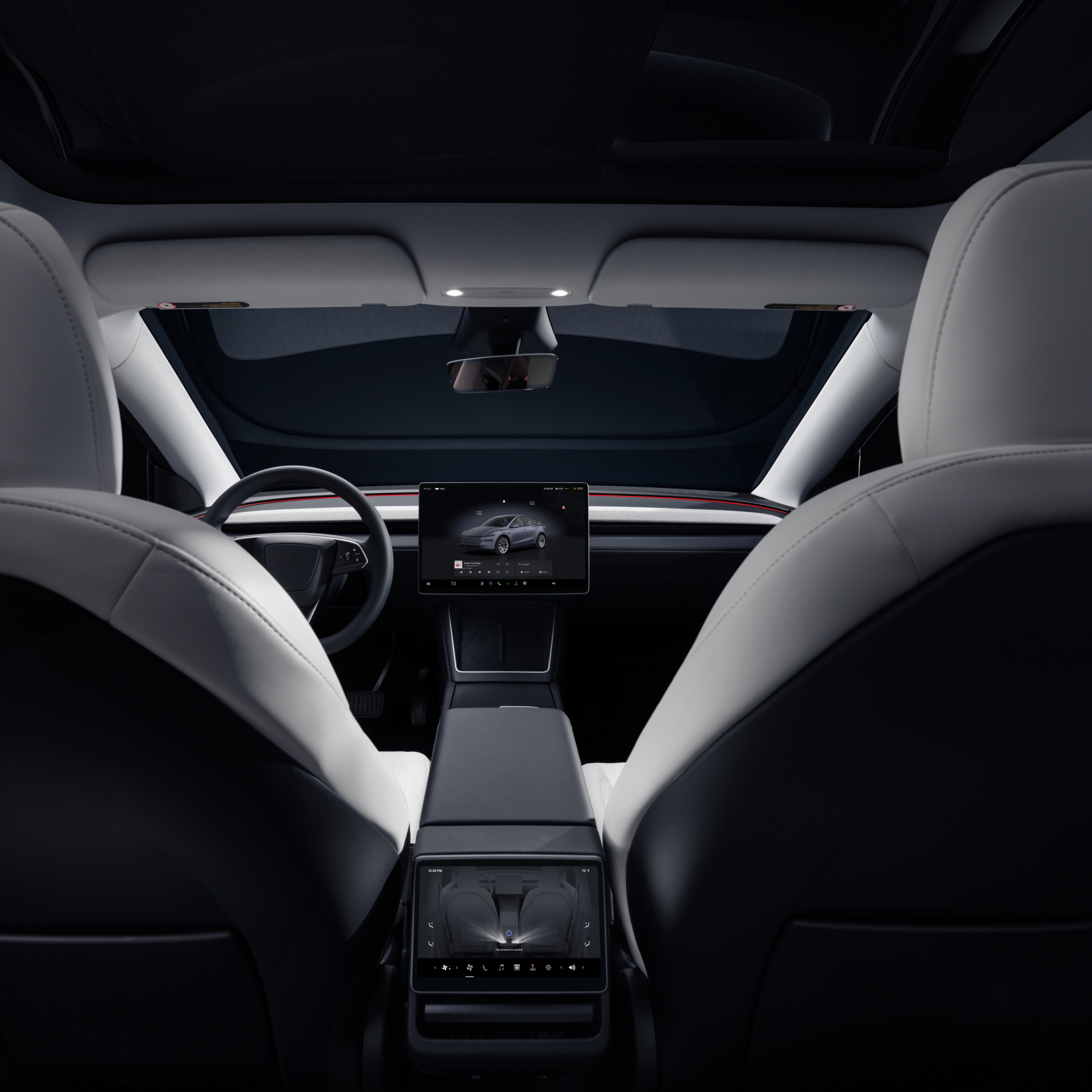 Vista del interior del Tesla Model Y 2025, destacando su diseño minimalista y tecnología avanzada.