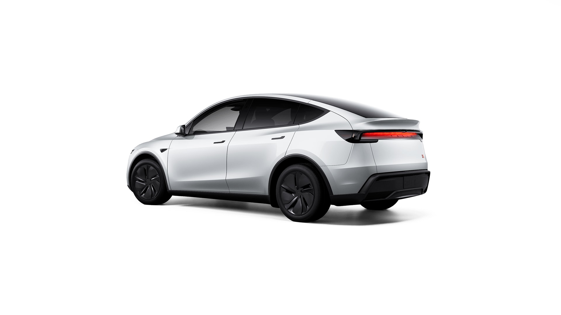 Vista lateral y trasera del Tesla Model Y 2025, destacando su diseño moderno.