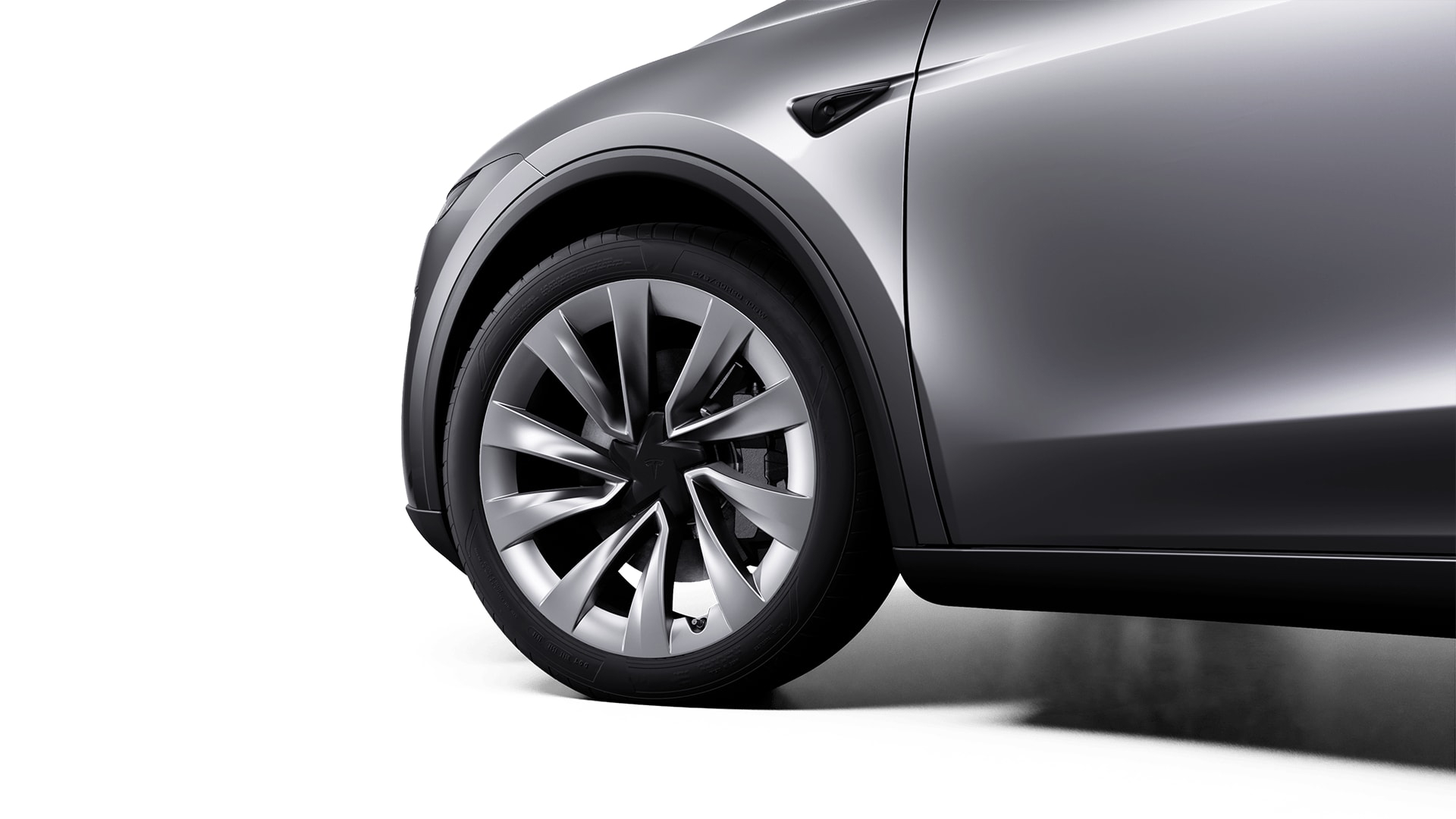 Vista lateral del Tesla Model Y 2025 que destaca su diseño moderno.