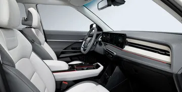 Detalles del interior moderno y confortable, ideal para cualquier viaje.