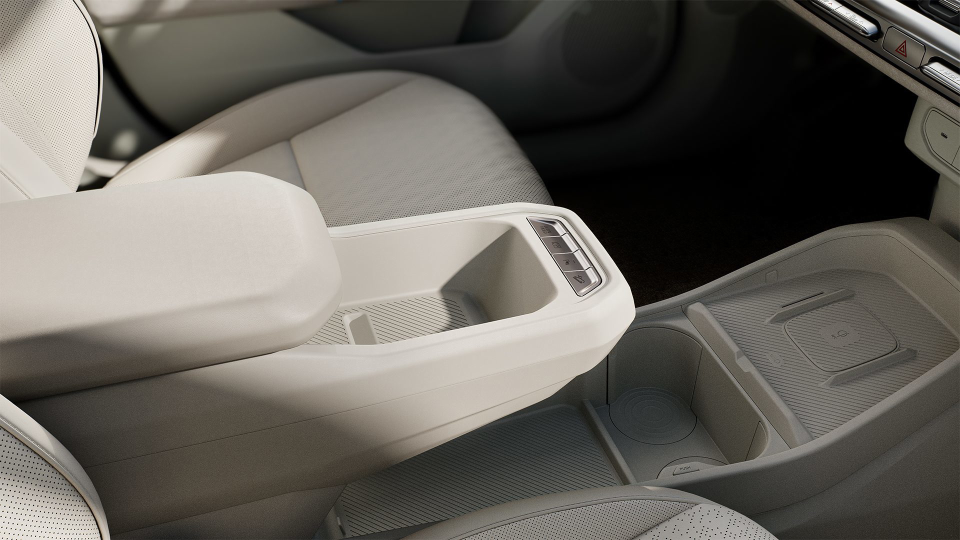 Detalle del diseño interior, con énfasis en los asientos y consola central.