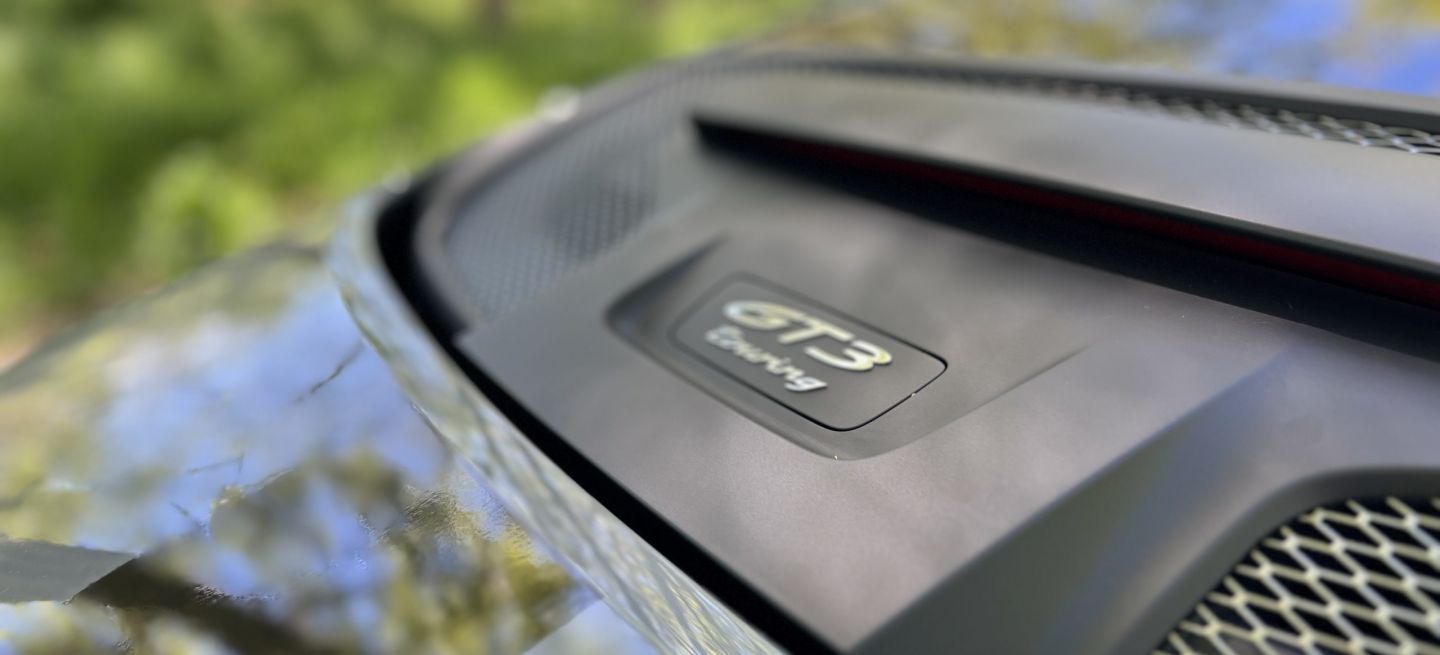 porsche-911-gt3-touring-13-1067090-scaled_1440x655c.jpg