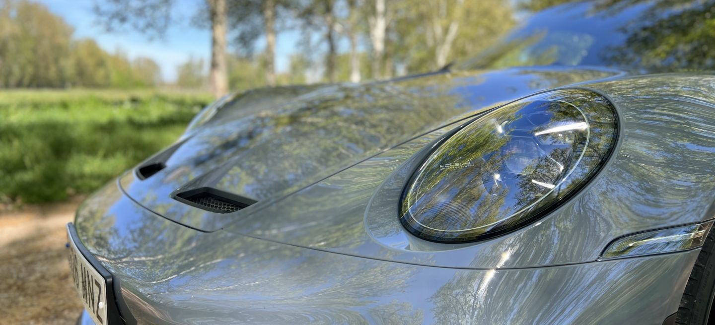 porsche-911-gt3-touring-19-1067097-scaled_1440x655c.jpg