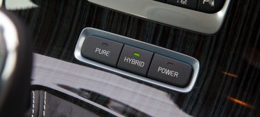 Selector modos de conducción del Volvo V60 D6 PHEV, ilustrando opciones Pure, Hybrid, Power.