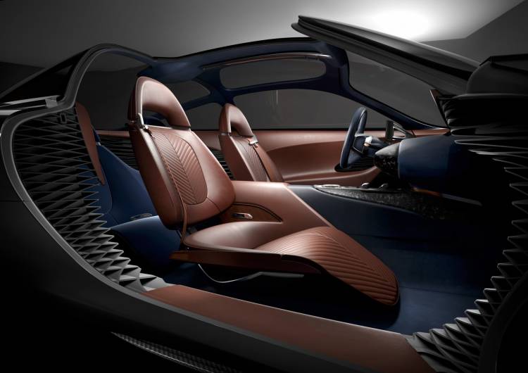 1274_thegenesisessentiaconceptutilizesamixed_materialapproachinfluencedbyhighfashionandclassiccolorcombinations_cognacleatherseatswithherringbonequiltingenvelopsthedriverandpassengersintruecockpitfash_750x.jpg